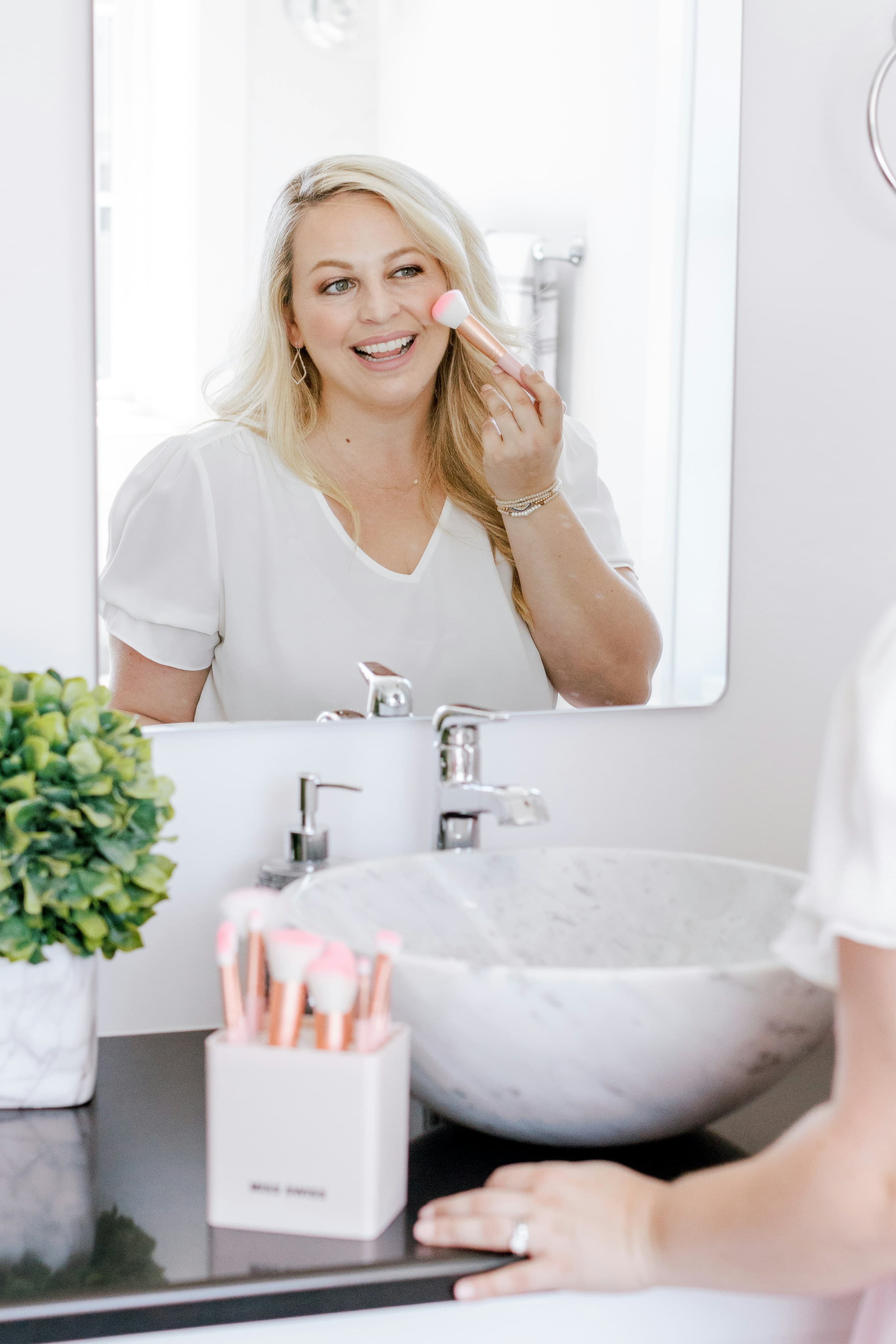 Tester testing a beauty product at home